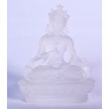 A GLASS FIGURE OF BUDDHA, modelled upon a lotus base. 9 cm x 7 cm.