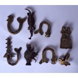 A GROUP OF AFRICAN BRONZE ARTICLES, varying form. Largest 8 cm long.