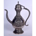 A LARGE EASTERN WHITE METAL COFFEE POT AND COVER, decorated with panels of foliage. 36 cm x 30 cm.