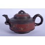 A CHINESE YIXING POTTERY TEAPOT AND COVER. 15 cm wide.