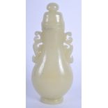 AN EARLY 20TH CENTURY CHINESE TWIN HANDLED GREEN JADE VASE AND COVER Mughal style. 14 cm x 5 cm.