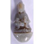 A CHINESE CARVED JADE FIGURE OF GUANYIN, modelled seated holding a rui sceptre. 7 cm long.