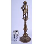 AN 18TH/19TH CENTURY INDIAN BRONZE BUDDHISTIC DEITY modelled standing upon a slender column. 42 cm