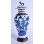 A 19TH CENTURY CHINESE BLUE AND WHITE CRACKLE GLAZED VASE AND COVER Qing. 23.5 cm high.