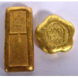 TWO CHINESE YELLOW METAL INGOTS. Largest 6.75 cm wide. (2)