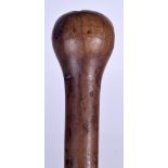 AN AFRICAN ZULU KNOBKERRIE, formed with a bulbous shaft. 84 cm long.