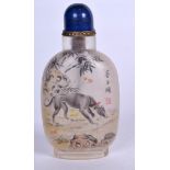 A CHINESE REVERSE PAINTED GLASS SNUFF BOTTLE, decorated with a dog in a landscape. 10.25 cm long.