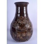 AN UNUSUAL HEAVY SALT GLAZED STUDIO POTTERY STONEWARE VASE with incised comical figures. 28 cm high