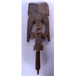 A NIGERIAN YORUBA POLYCHROMED WOODEN SCEPTRE, formed as a female. 54 cm long.