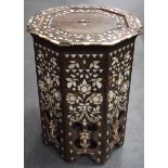 AN EARLY 20TH CENTURY WOODEN OTTOMAN STOOL, inset with mother of pearl and bone decoration. 53 cm x