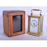 A LEATHER CASED FRENCH CARRIAGE CLOCK. 15 cm high inc handle.