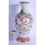 A LARGE EARLY 20TH CENTURY CHINESE CANTON FAMILLE ROSE VASE Guangxu, bearing Qianlong marks to base
