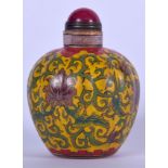 A CHINESE PEKING GLASS SNUFF BOTTLE BEARING QIANLONG MARKS, decorated with extensive foliage over y