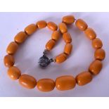 A NATURAL AMBER NECKLACE, weight 94 grams. 52 cm long.