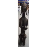 A LARGE MALIAN BAMBARA WOODEN FERTILITY FIGURE, formed as a female with child sucking one breast. 9