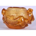 A CHINESE AMBER COLOURED PEKING GLASS BRUSH WASHER, overlaid with chilong. 10 cm wide.