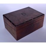 AN ANTIQUE WRITING SLOPE BOX, subtle mother of pearl inlay to rim of lid. 15 cm x 31 cm.