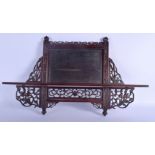 A 19TH CENTURY CHINESE HONGMU HANGING SHELF. 75 cm x 32 cm.