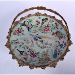A 19TH CENTURY CHINESE CELADON FAMILLE ROSE PLATE with French bronze ormolu mounts. 28 cm x 24 cm.