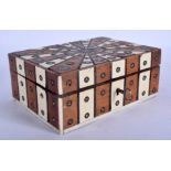 A 19TH CENTURY ANGLO INDIAN GEOMETRIC IVORY BOX AND COVER decorated with motifs. 16 cm x 11 cm.