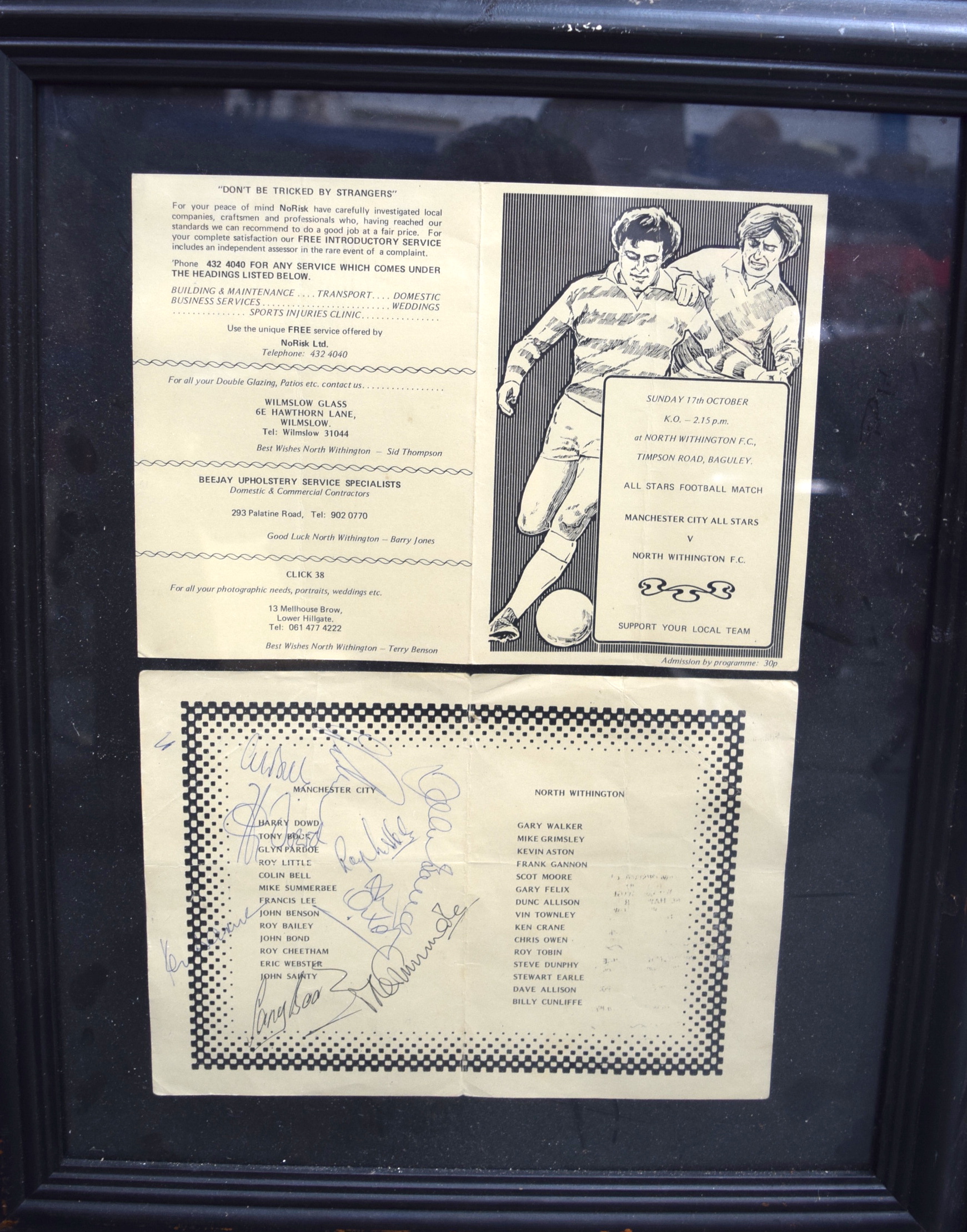 A MANCHESTER CITY FOOTBALL CLUB FRAMED AUTOGRAPH PROGRAMME, including Colin Bell & Mike Summerbee.