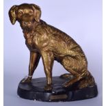 A LARGE PLASTER STATUE OF A DOG, modelled seated, reputedly belonged to a local Lord. 29 cm x 25 cm