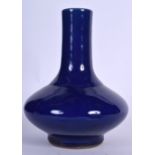 A CHINESE BLUE MONOCHROME PORCELAIN VASE BEARING KANGXI MARKS, formed with a bulbous body. 27 cm hi