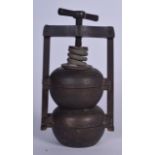 AN UNUSUAL ANTIQUE PRESS OR MOULD. 25 cm high.