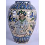 A LARGE 19TH CENTURY PERSIAN QAJAR POTTERY VASE painted with figures. 30 cm high.