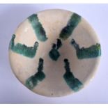 A 10TH/12TH CENTURY NISHAPUR BUFFWARE POTTERY BOWL painted with green splash 10.5 cm wide.