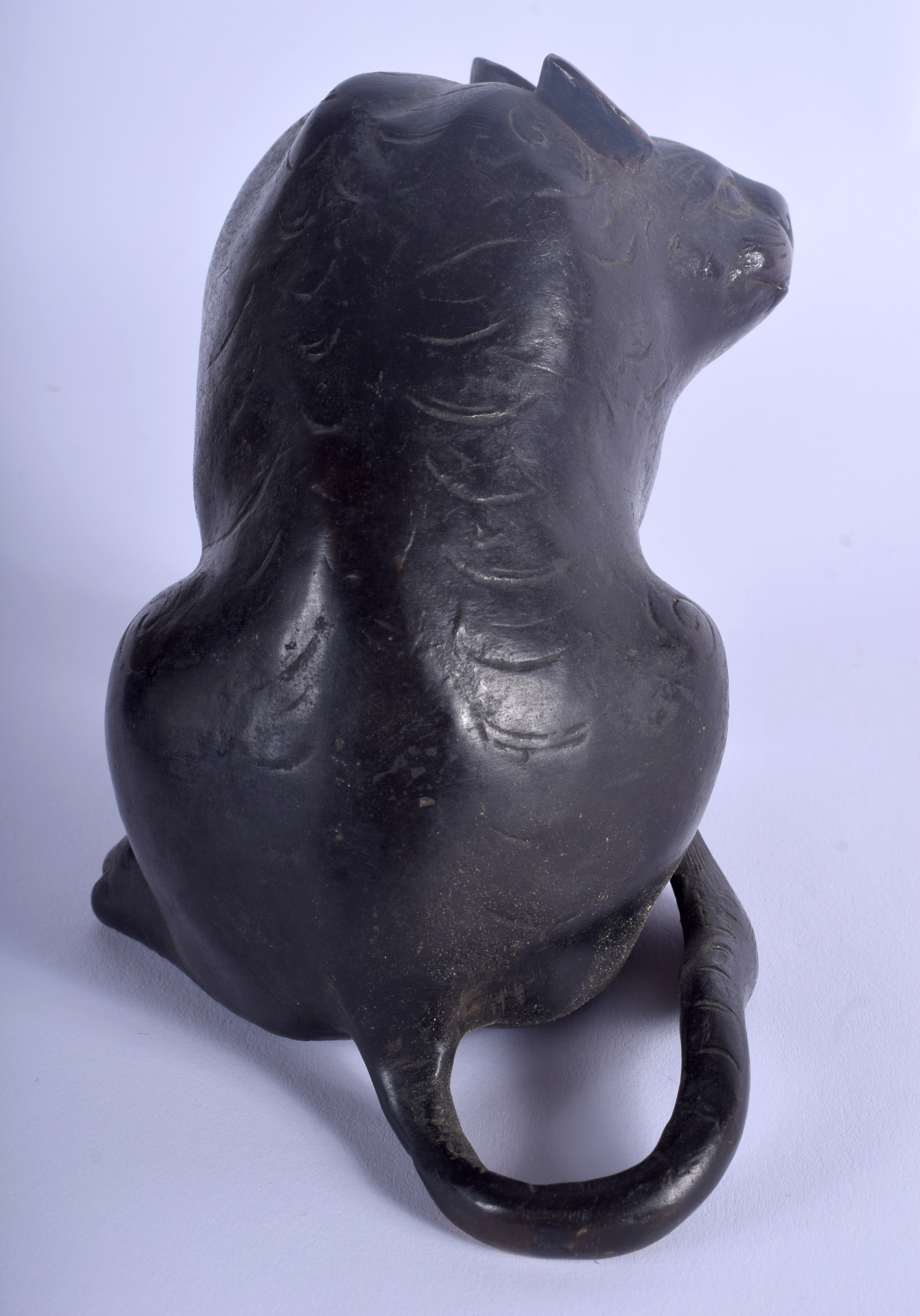 A 19TH CENTURY JAPANESE MEIJI PERIOD BRONZE OKIMONO modelled as a scowling cat. 15 cm x 13 cm. - Image 3 of 4
