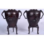 A PAIR OF 19TH CENTURY JAPANESE MEIJI PERIOD TWIN HANDLED BRONZE VASES decorated with birds. 30 cm