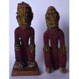 A PAIR OF CAMEROON BAMILEKE BEADWORK FIGURE, decorated with seed like nuts to the head and feet. 40