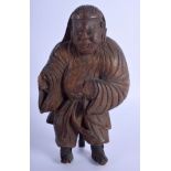 AN EARLY 19TH CENTURY JAPANESE EDO PERIOD CARVED WOOD MALE modelled wearing flowing robes. 21 cm x