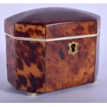 A REGENCY CARVED TORTOISESHELL RECTANGULAR TEA CADDY with ivory banding and ivory fun feet. 11 cm x