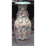 A MONUMENTAL 19TH CENTURY CHINESE CANTON FAMILLE ROSE VASE Qing, painted with foliage and warriors