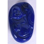 A CHINESE CARVED LAPIS BOULDER, forming a grinning buddha, 20th century. 6 cm long.