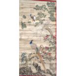 A CHINESE WATERCOLOUR SCROLL PAINTING, depicting exotic birds by flowering rock. 127 cm x 64 cm.