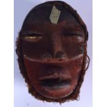 A LIBERIAN WOODEN KRAN MASK, formed with a lacquered face. 29 cm x 21 cm.