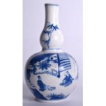 A CHINESE BLUE AND WHITE PORCELAIN DOUBLE GOURD VASE BEARING KANGXI MARKS, painted with scholars in