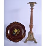 A VICTORIAN PAPIER MACHE LACQUERED DISH painted with flowers, together with a brass pricket candles