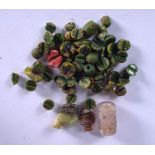 A QUANTITY OF ASSORTED BEADS, including an agate toggle. (qty)