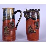 A JAPANESE SUMIDA GAWA POO WARE POTTERY JUG, together with another vessel. Largest 25 cm. (2)