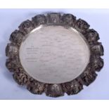 A LARGE 19TH CENTURY CONTINENTAL SILVER EMBOSSED CHARGER decorated with Heraldic crests and boats.