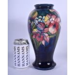 A LARGE MOORCROFT ORCHID VASE of baluster form. 26 cm high.