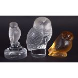 THREE FRENCH LALIQUE GLASS OWLS. Largest 9.25 cm high. (3)
