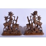 A PAIR OF 19TH CENTURY BAVARIAN BLACK FOREST DEER BOOKENDS modelled in naturalistic form. Each 40 c