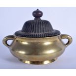 A LARGE 18TH CENTURY CHINESE TWIN HANDLED BRONZE CENSER bearing Xuande marks to base. 2200 grams. 2