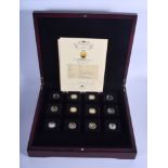 A CASED SET OF TWELVE 9CT GOLD PROOF COINS. 12 grams. (12)