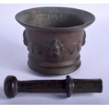 A 17TH CENTURY CONTINENTAL PESTLE AND MORTAR. (2)